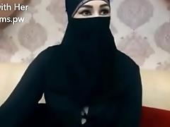 Indian Muslim girl in hijab live chatting on webcam